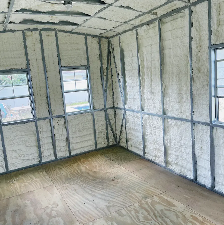 Closed-cell spray foam insulation applied to wall cavities in a residential project in Laurel Bay